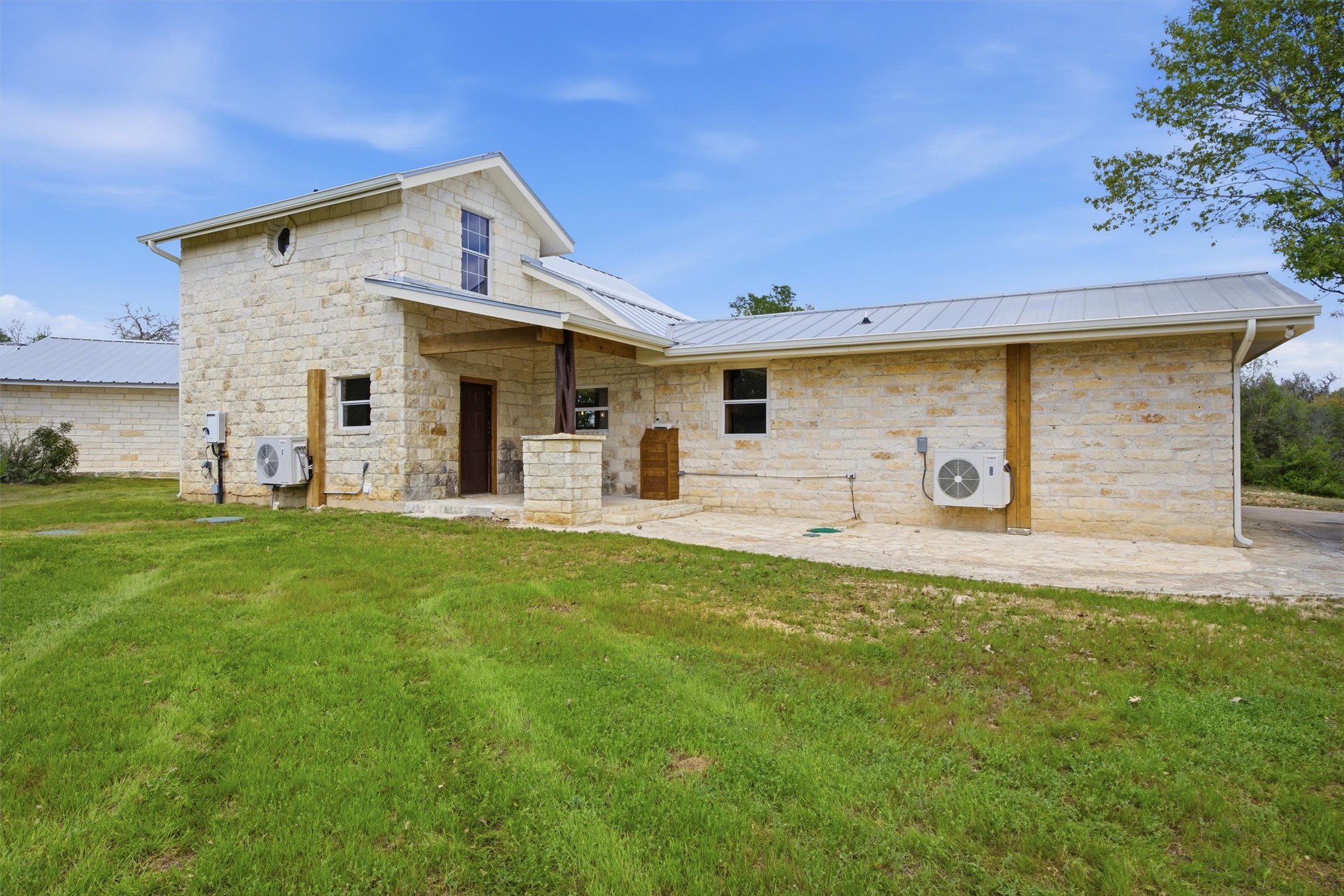 Undisclosed Address Buda, TX 78610 - Photo 16 of 19 a front view of house with yard