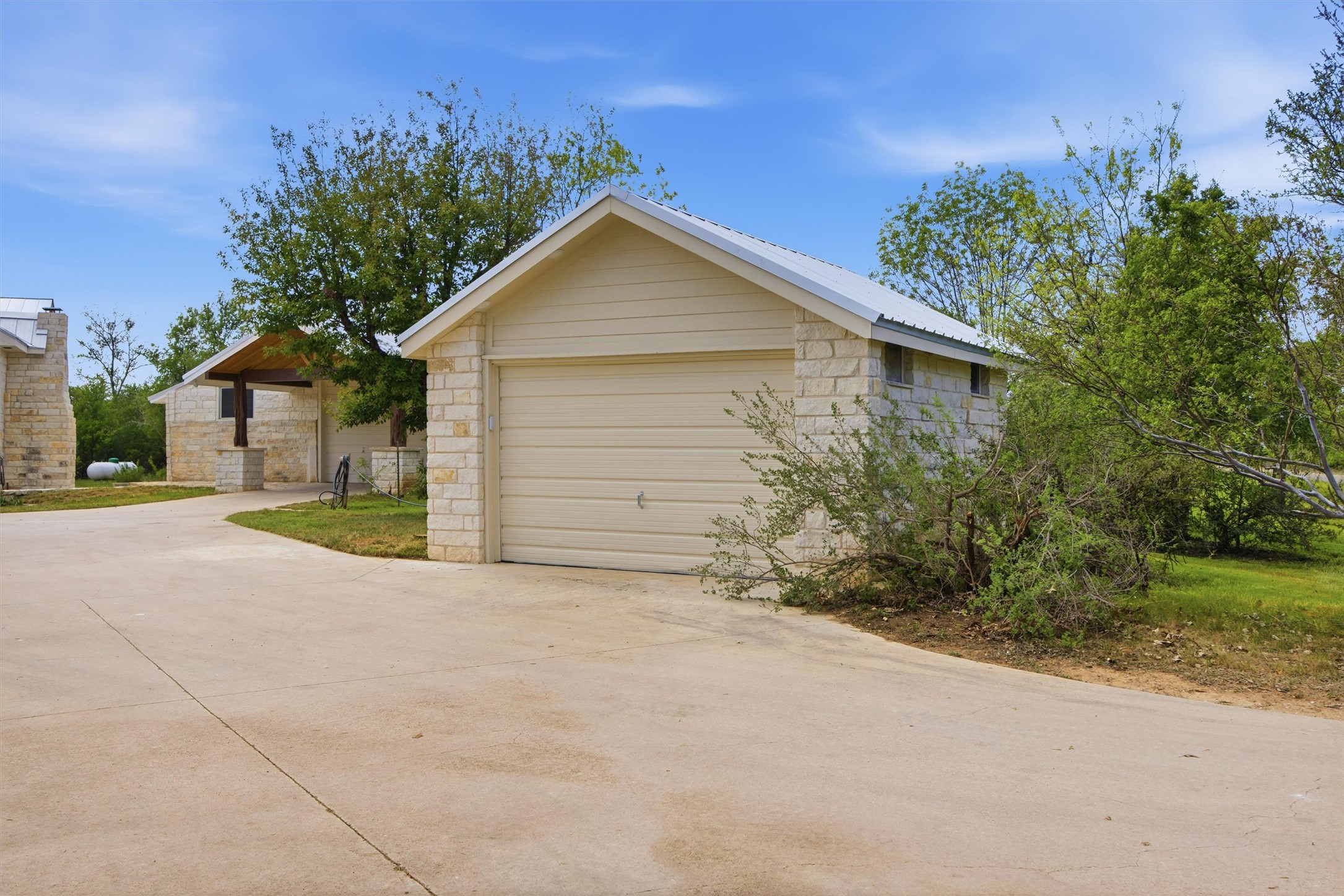 Undisclosed Address Buda, TX 78610 - Photo 17 of 19 a view of house with backyard and garden