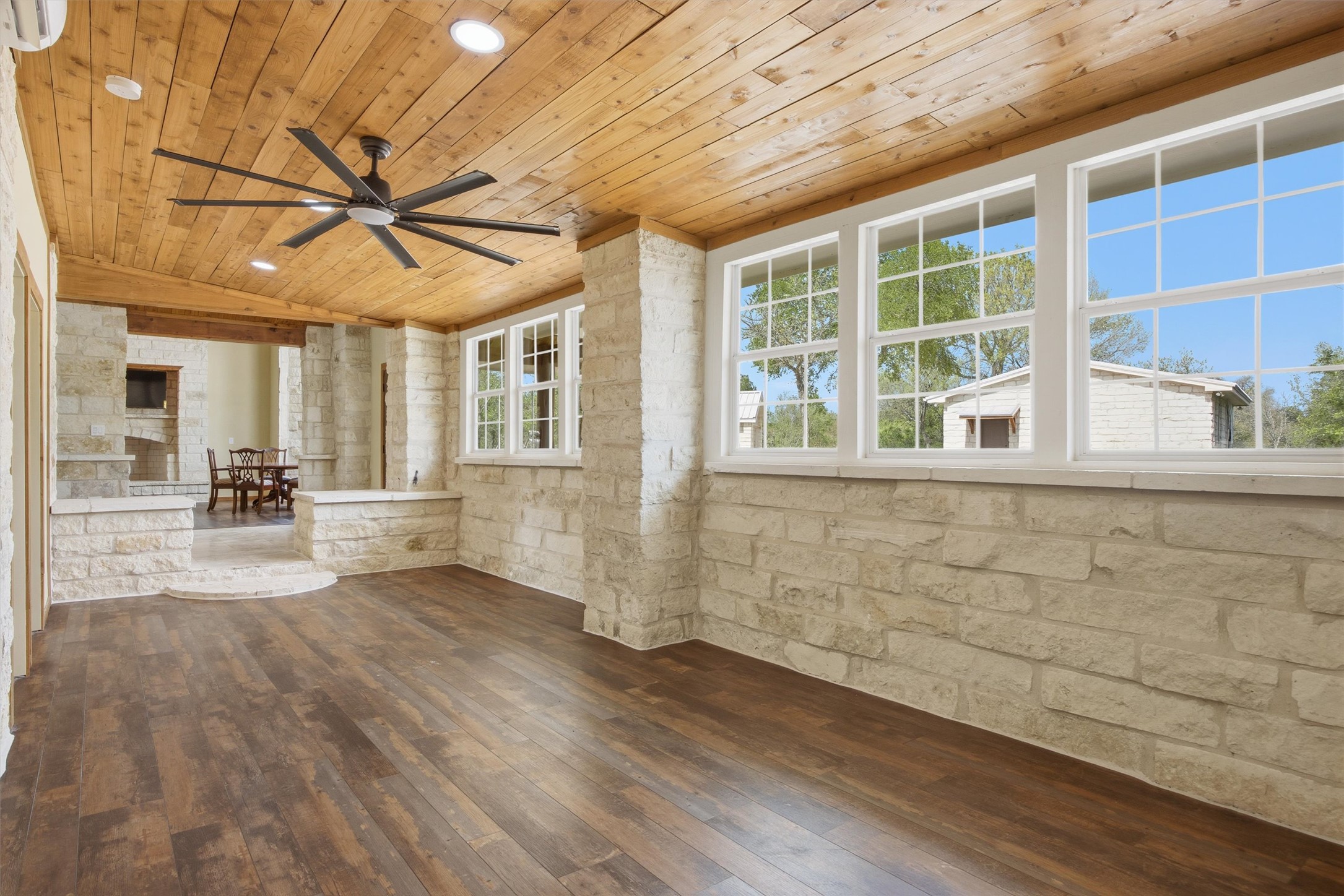 Undisclosed Address Buda, TX 78610 - Photo 7 of 19 a view of an entryway with wooden floors