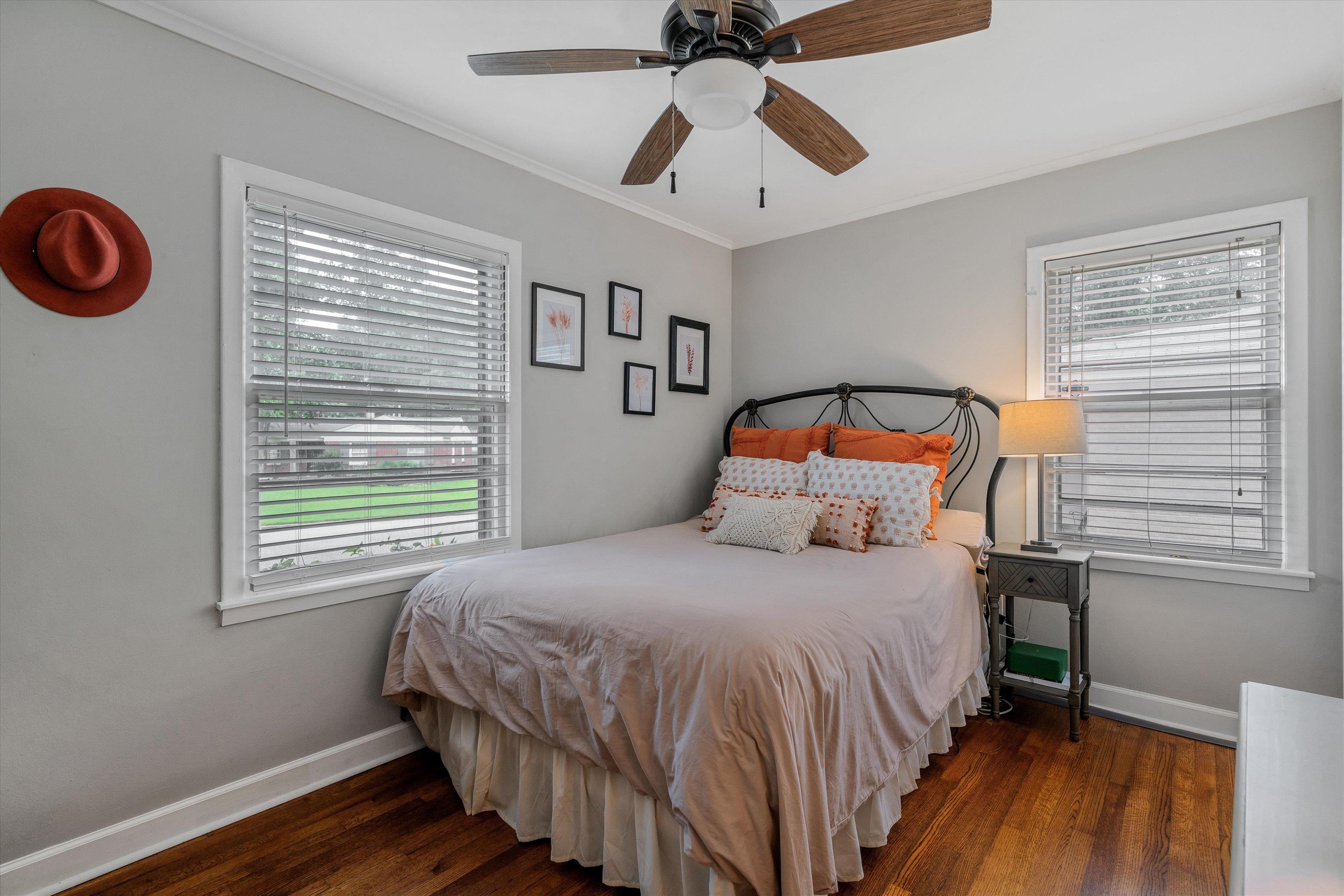 1064 Wilbec Road Memphis, TN 38117 - Photo 11 of 23 a bedroom with a bed a dresser and a window