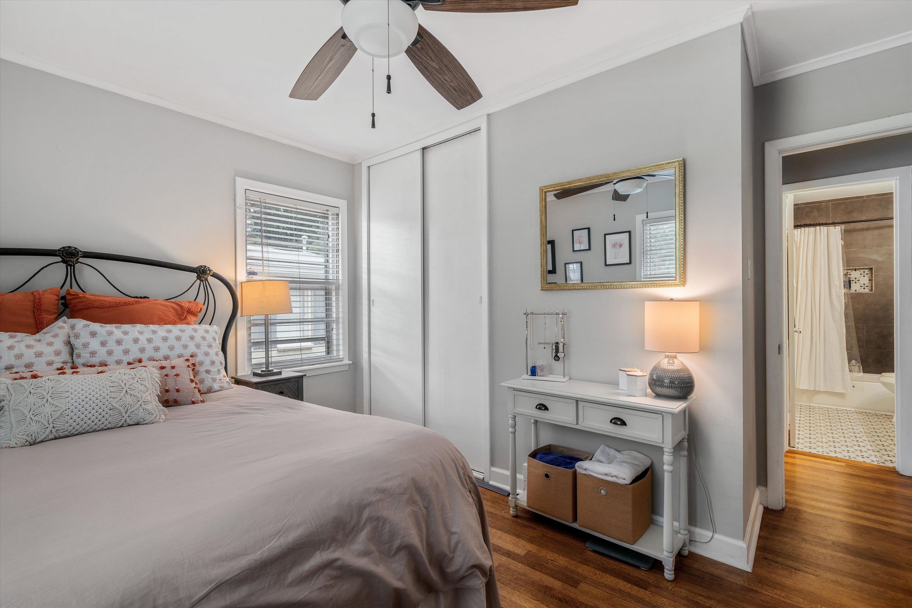 1064 Wilbec Road Memphis, TN 38117 - Photo 12 of 23 a bedroom with a bed and wooden floor