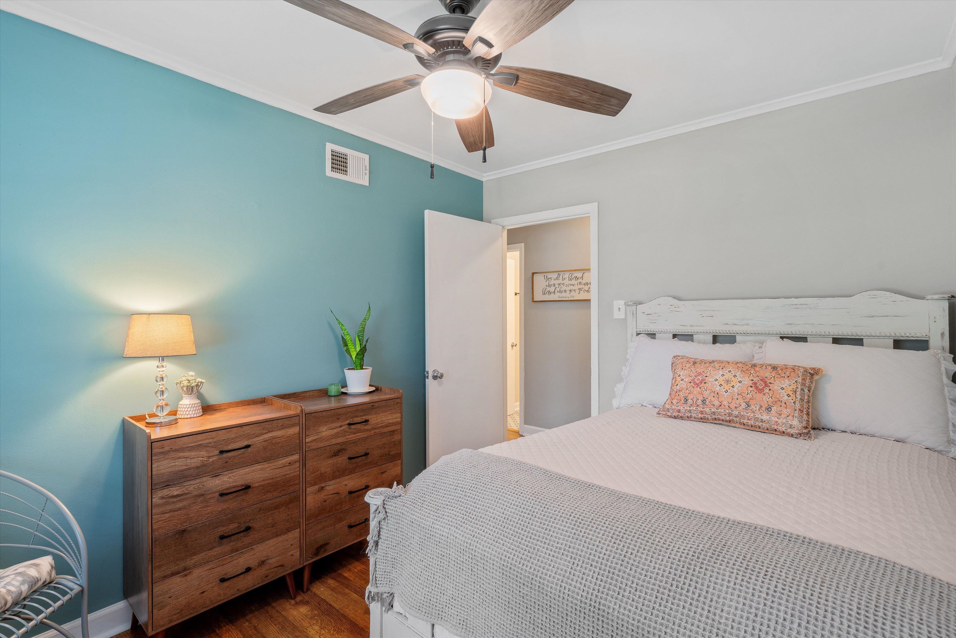 1064 Wilbec Road Memphis, TN 38117 - Photo 13 of 23 a bedroom with a bed and a lamp on the dresser