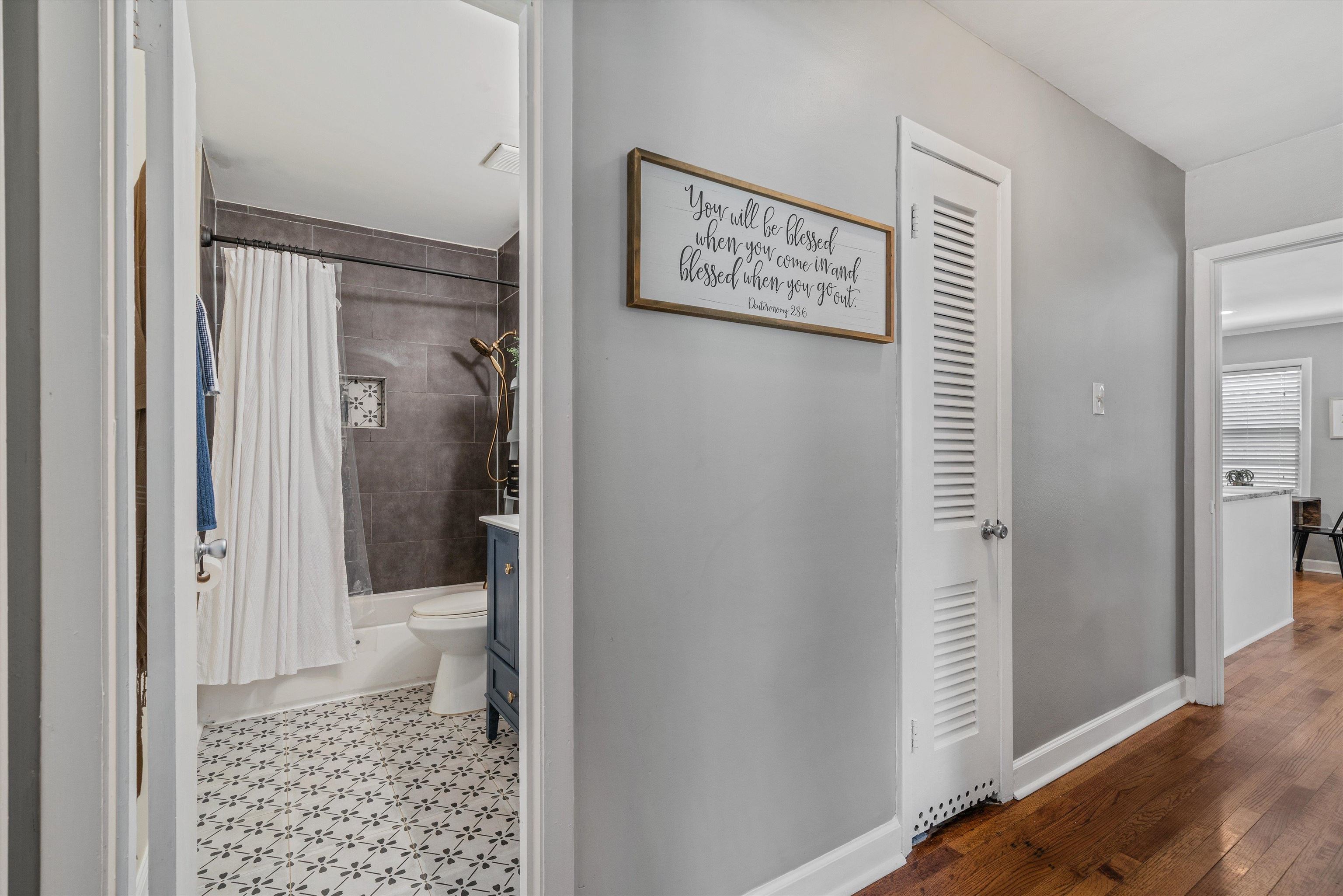 1064 Wilbec Road Memphis, TN 38117 - Photo 15 of 23 a bathroom with a toilet and a shower