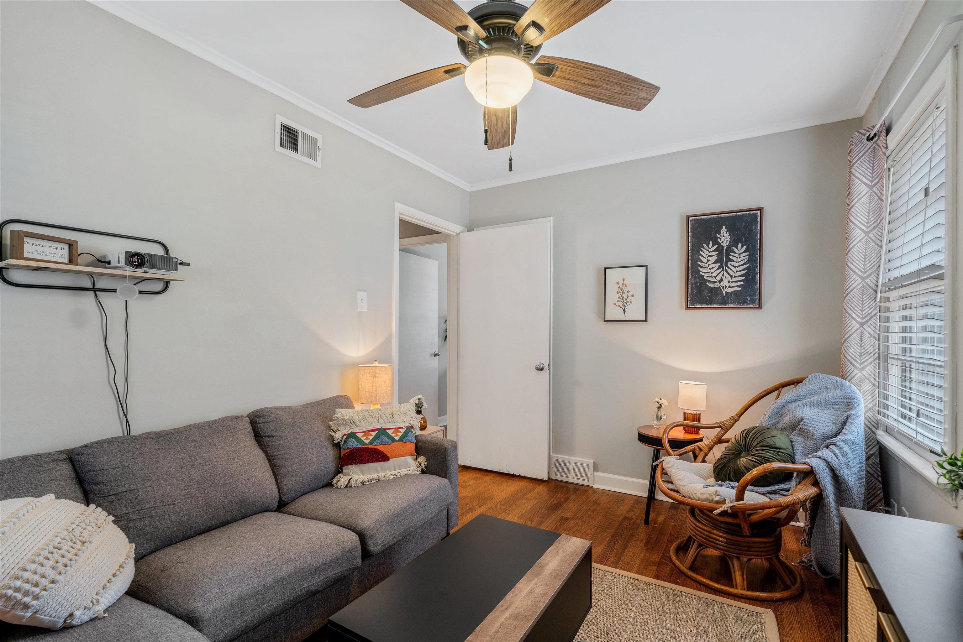 1064 Wilbec Road Memphis, TN 38117 - Photo 18 of 23 a living room with furniture and a window