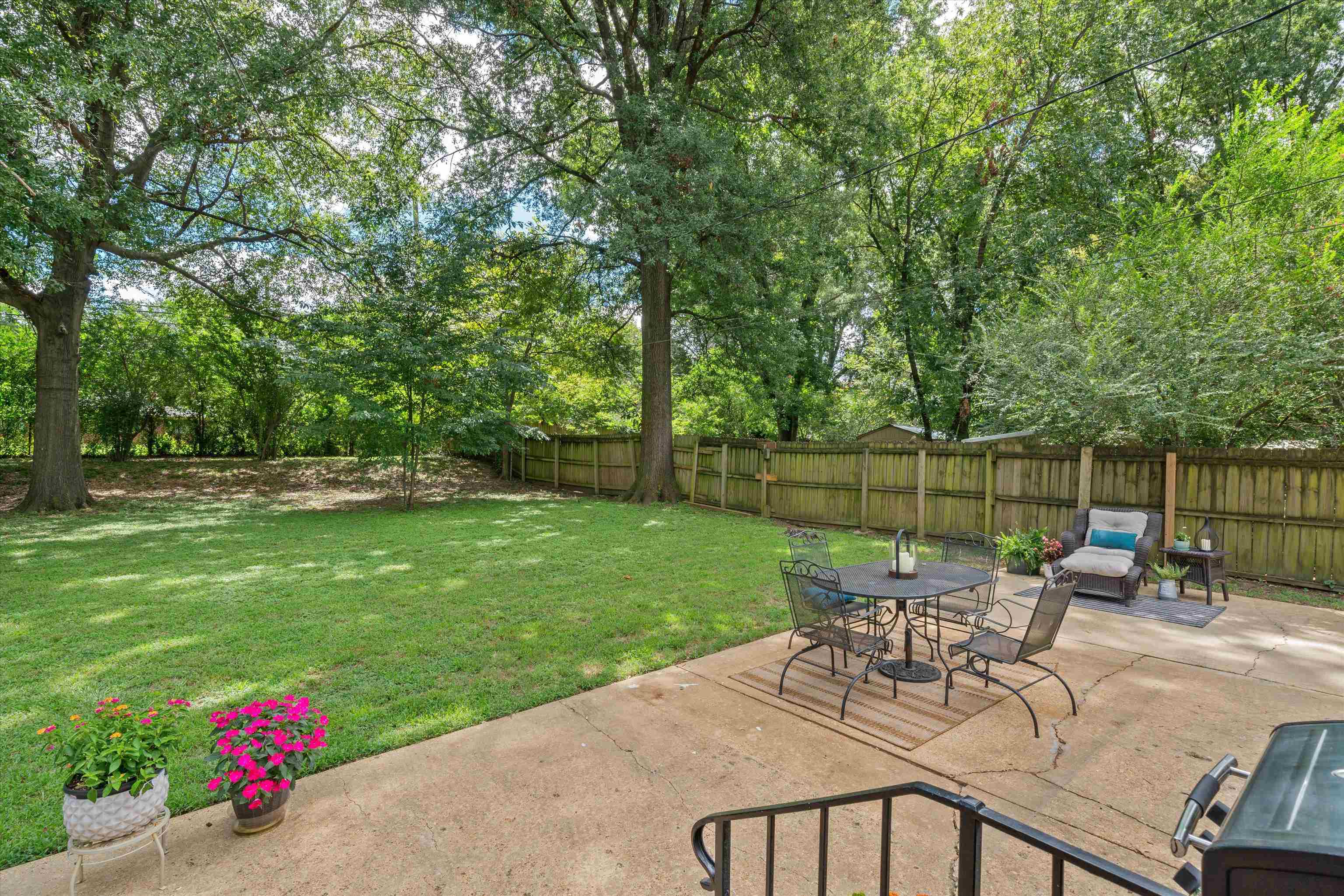 1064 Wilbec Road Memphis, TN 38117 - Photo 20 of 23 a view of a backyard with sitting area