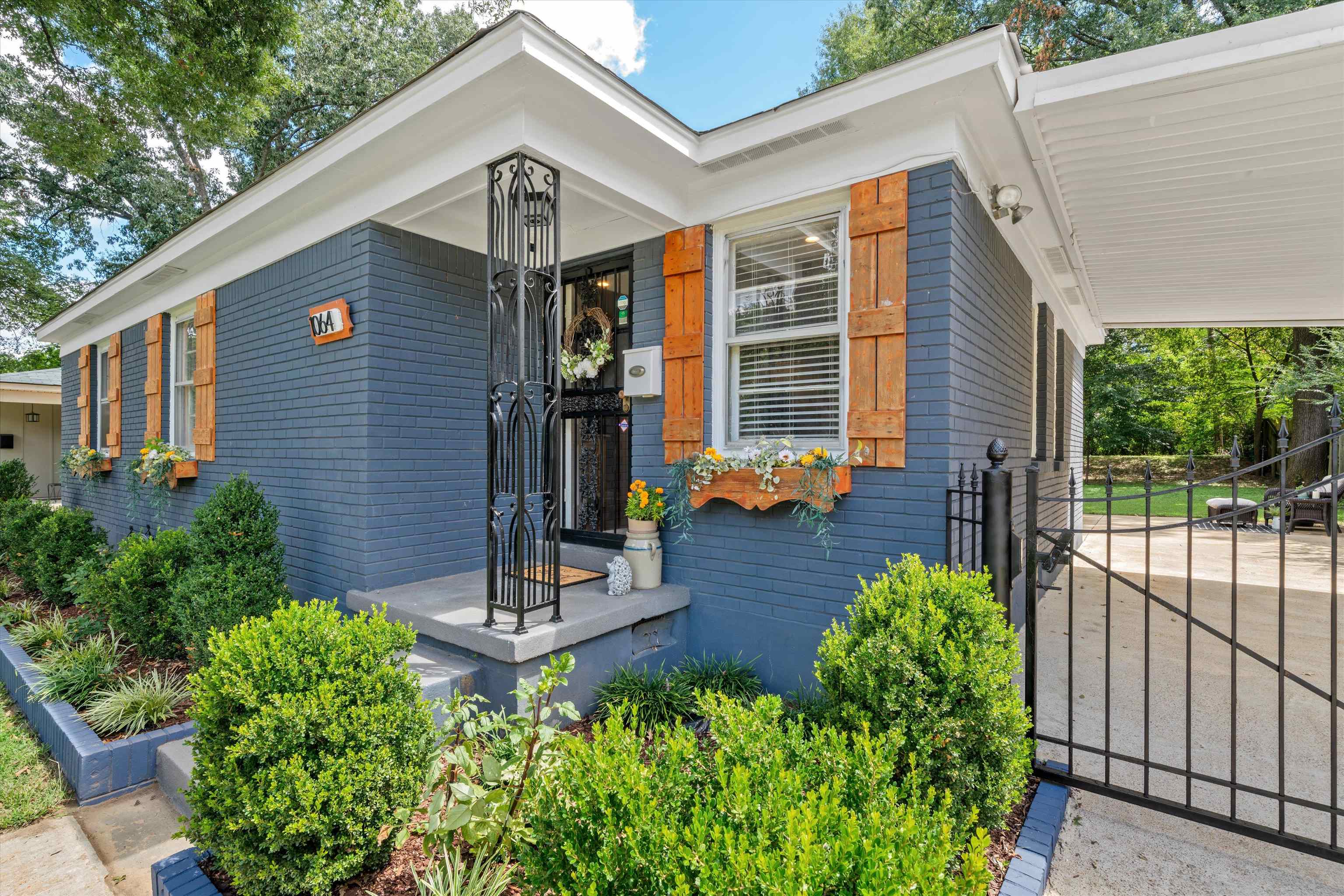 1064 Wilbec Road Memphis, TN 38117 - Photo 2 of 23 a front view of a house with a porch