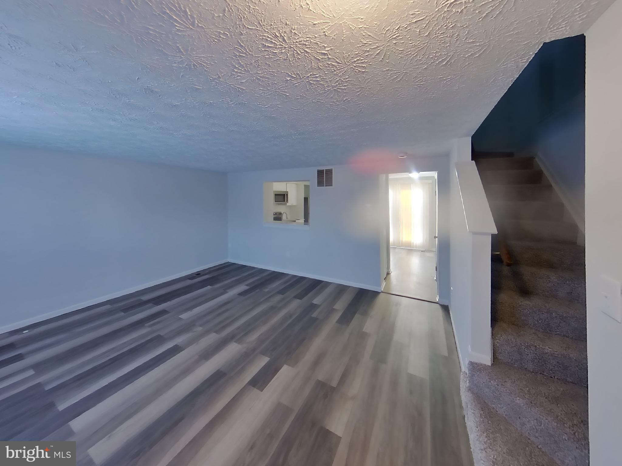 35 Greenleaf Road Baltimore, MD 21234 - Photo 3 of 14 a view of empty room with wooden floor