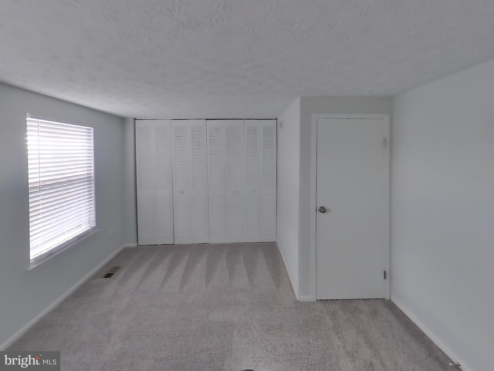 35 Greenleaf Road Baltimore, MD 21234 - Photo 7 of 14 a view of an empty room with a window