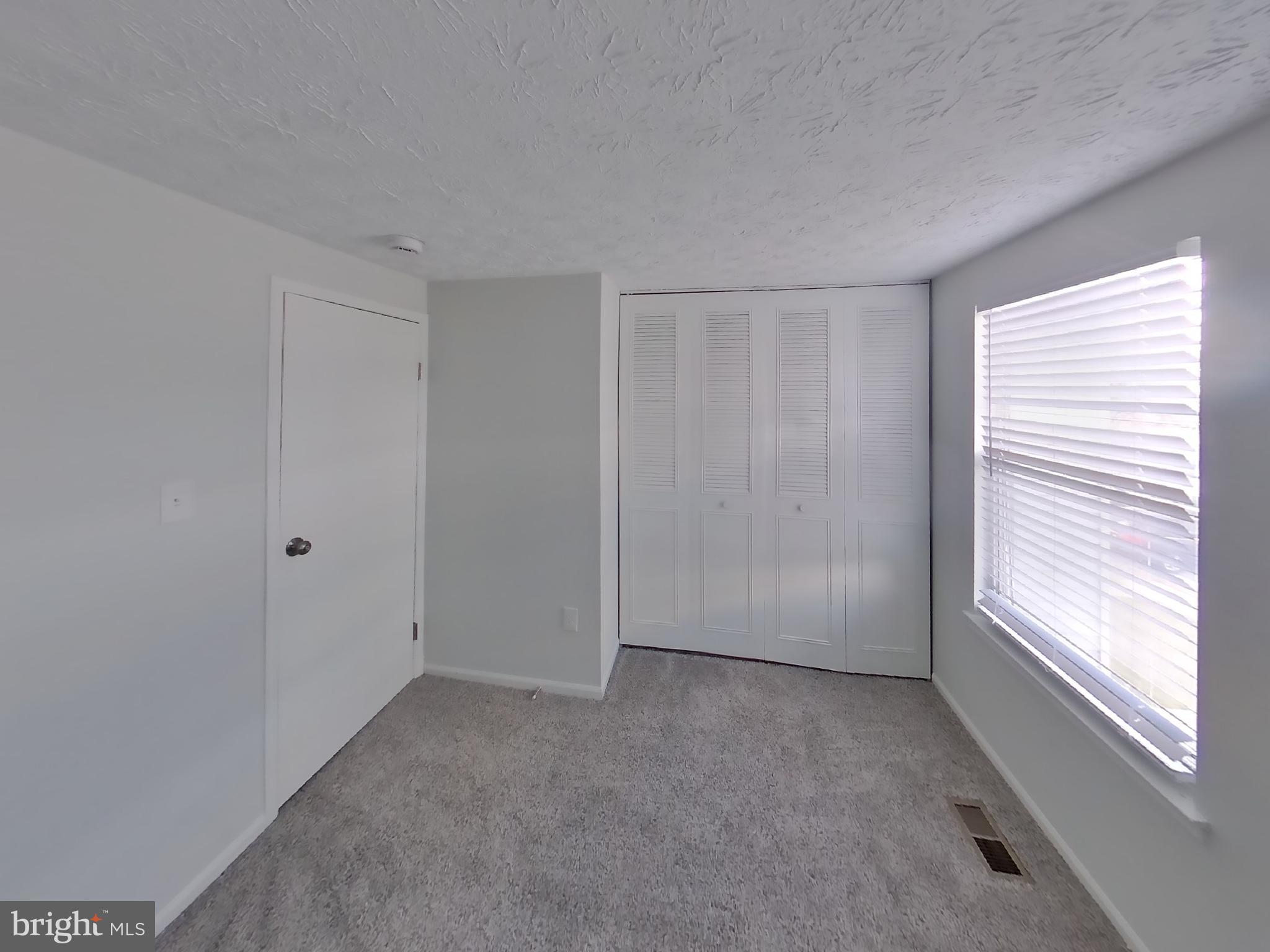 35 Greenleaf Road Baltimore, MD 21234 - Photo 9 of 14 a view of an empty room with a window