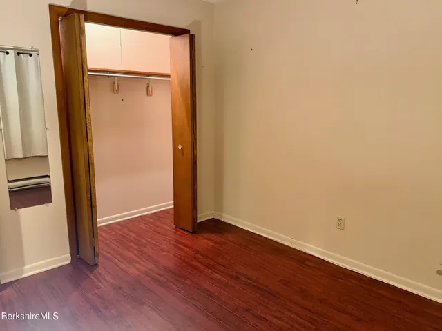 a kitchen with stainless steel appliances a refrigerator microwave and stove