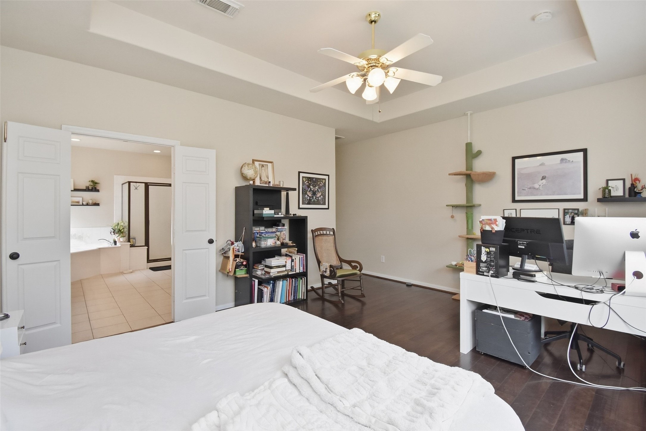 5615 Edgewood Pl Drive Spring, TX 77379 - Photo 27 of 48 Expansive primary suite with flexible layout, ideal for a home office or reading nook, and direct access to the en-suite bath.