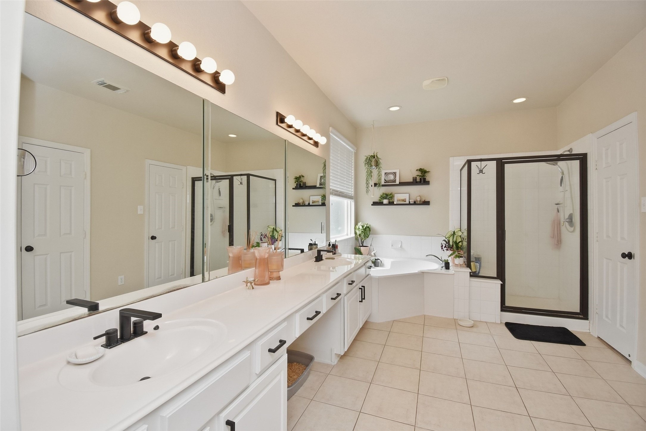 5615 Edgewood Pl Drive Spring, TX 77379 - Photo 28 of 48 Primary bathroom offering dual vanities, extensive counter space and abundant storage, designed for both convenience and comfort.