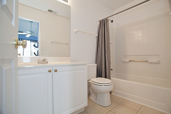 3448 Ravinia Circle Aurora, IL 60504 - Photo 12 of 20 a bathroom with a sink a toilet and shower