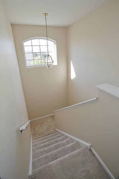 3448 Ravinia Circle Aurora, IL 60504 - Photo 13 of 20 a view of empty room with window and chandelier fan