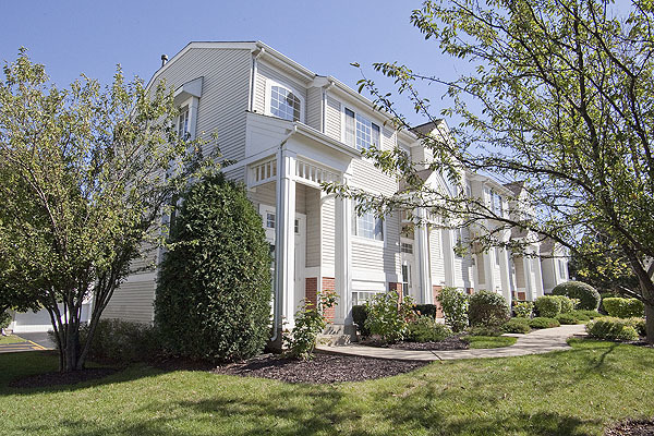 3448 Ravinia Circle Aurora, IL 60504 - Photo 19 of 20 a front view of a house with yard and green space