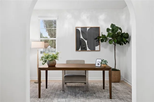 a view of a workspace with furniture