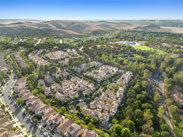 a view of a street with cars
