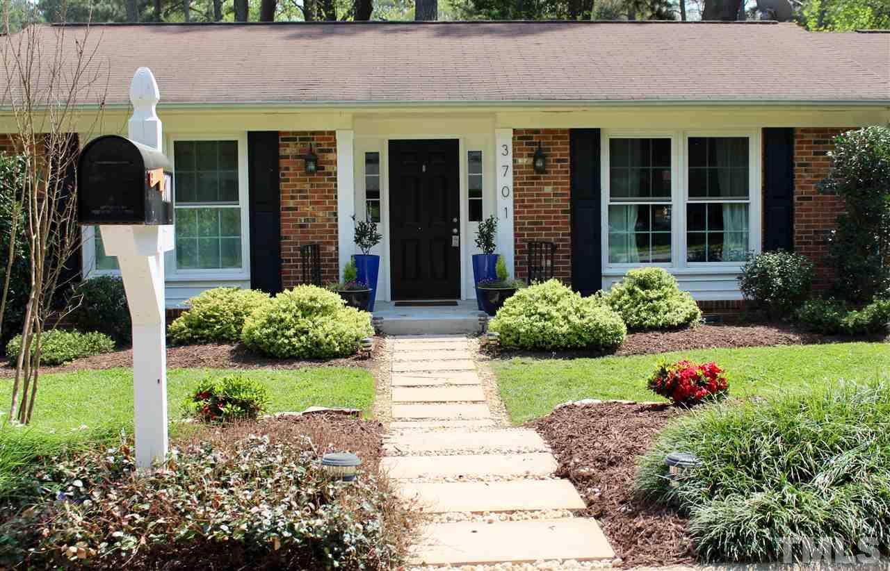 3701 Lail Court Raleigh, NC 27606 - Photo 25 of 25 a front view of a house with garden