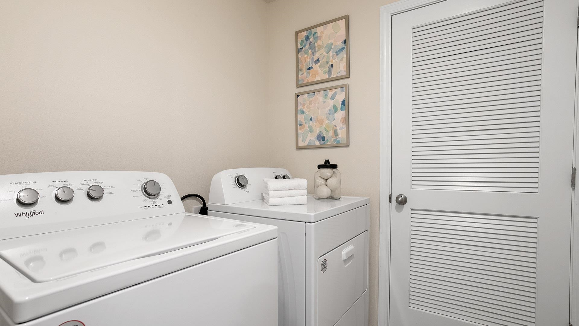 121 Redbud Road Palm Coast, FL 32137 - Photo 21 of 33 a utility room with dryer and washer