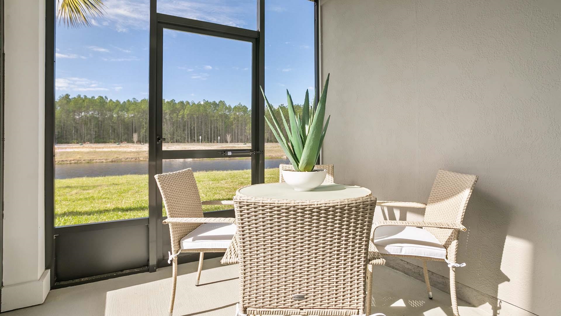 121 Redbud Road Palm Coast, FL 32137 - Photo 22 of 33 a view of a dining room with furniture window and outside view