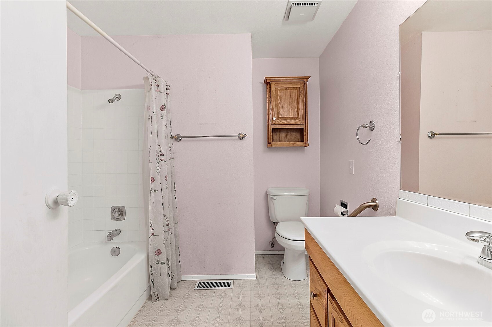 2115 Whitman Avenue Northeast Renton, WA 98059 - Photo 19 of 40 a bathroom with a sink a toilet and shower