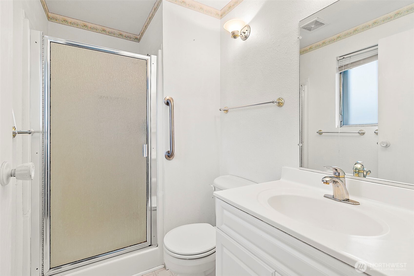 2115 Whitman Avenue Northeast Renton, WA 98059 - Photo 24 of 40 a bathroom with a sink toilet and shower