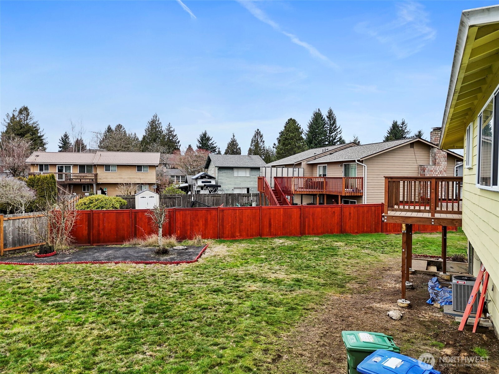 2115 Whitman Avenue Northeast Renton, WA 98059 - Photo 35 of 40 a view of a house with backyard porch and sitting area