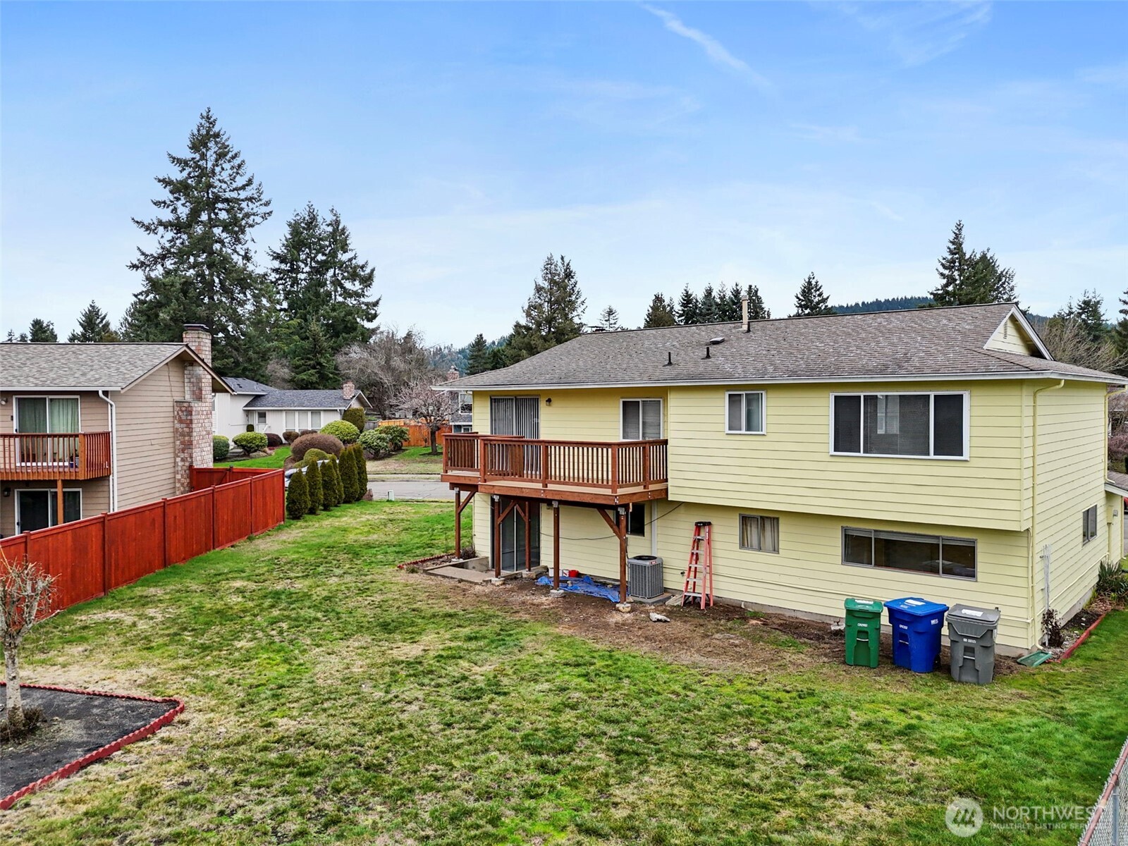 2115 Whitman Avenue Northeast Renton, WA 98059 - Photo 36 of 40 a view of house with backyard