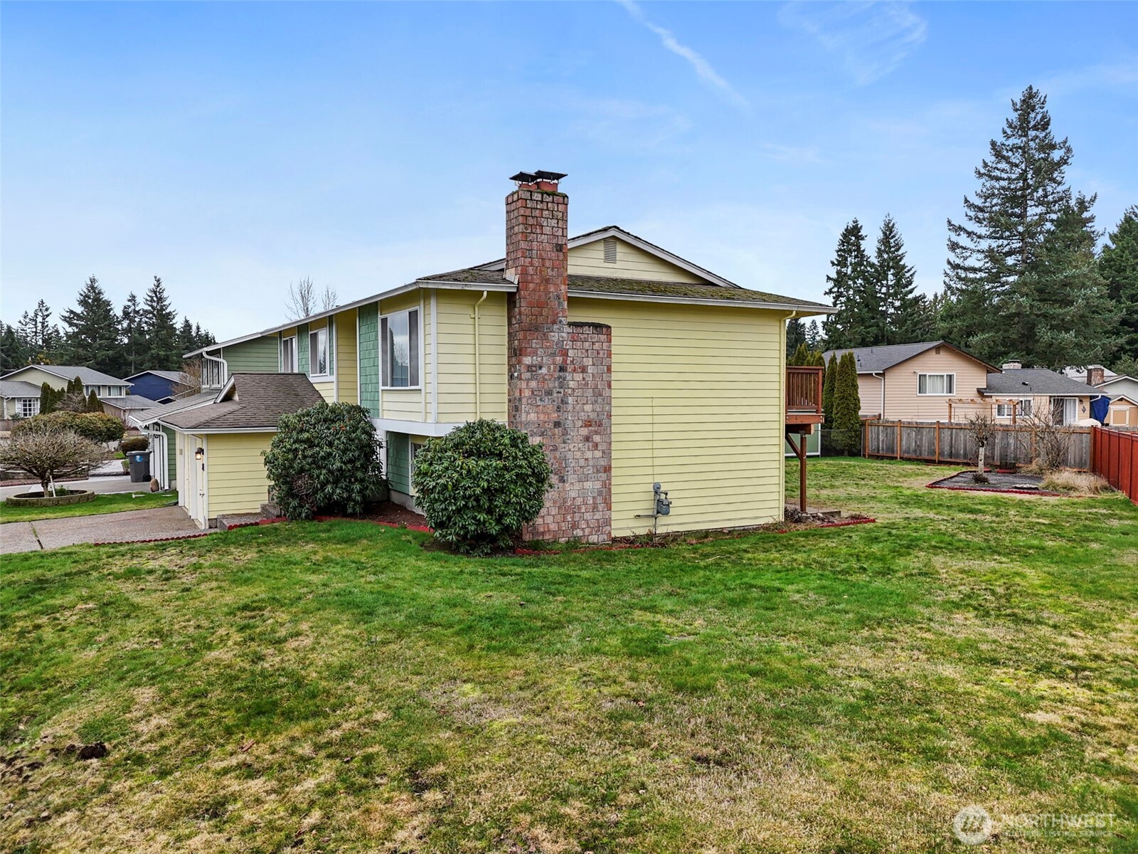 2115 Whitman Avenue Northeast Renton, WA 98059 - Photo 37 of 40 a front view of a house with garden