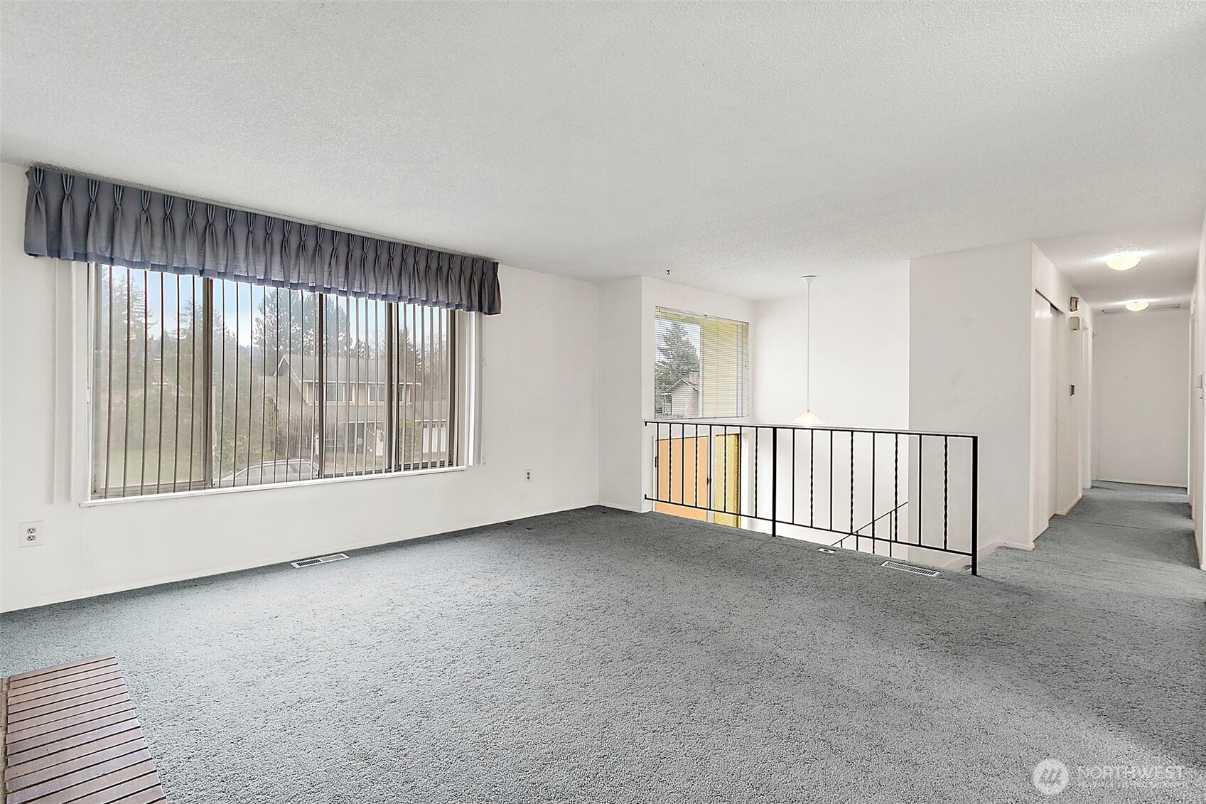 2115 Whitman Avenue Northeast Renton, WA 98059 - Photo 8 of 40 a view of an empty room with a window