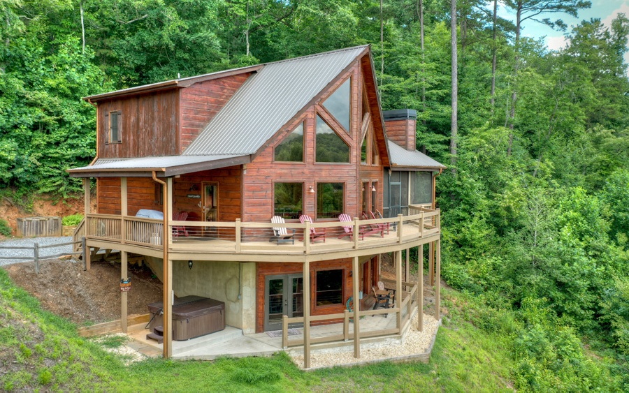 240 West Shalom Court Blue Ridge, GA 30513 - Photo 1 of 1 a view of house with a yard and sitting area