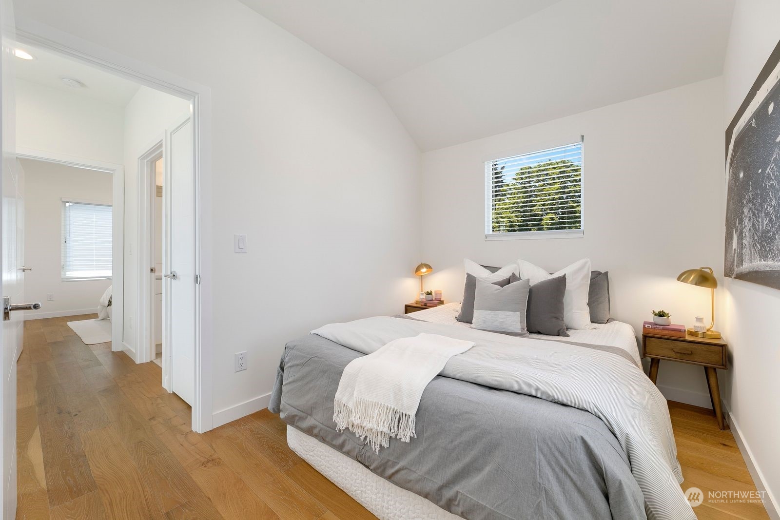 4246 South Graham Street Seattle, WA 98118 - Photo 11 of 21 a bedroom with a bed and a window