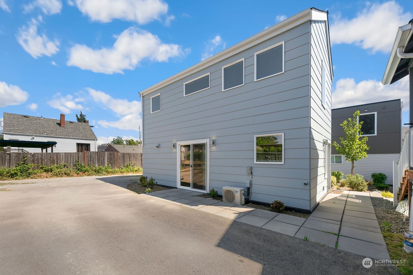 4246 South Graham Street Seattle, WA 98118 - Photo 21 of 21 a view of a house with a street