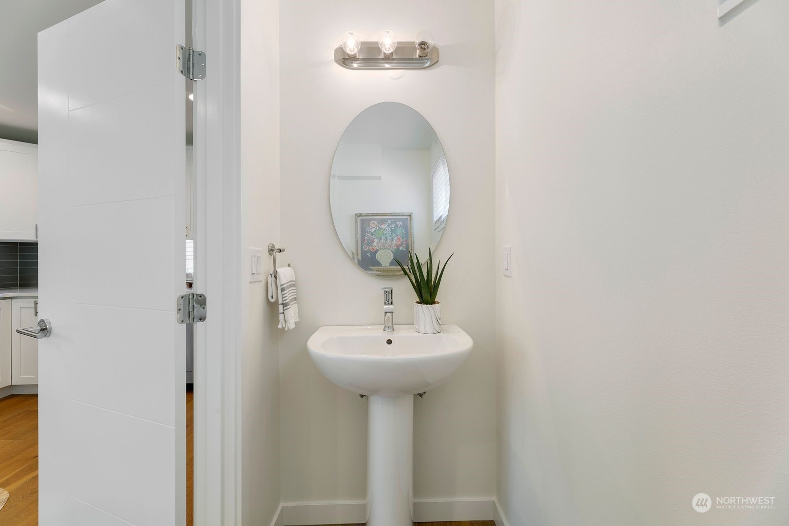 4246 South Graham Street Seattle, WA 98118 - Photo 10 of 21 a bathroom with a sink and a mirror