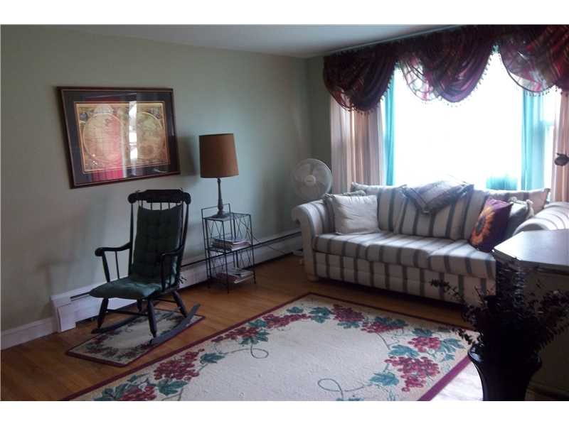 10 Rutherford Court, Unit 4 Warwick, RI 02886 - Photo 3 of 8 Living Room.