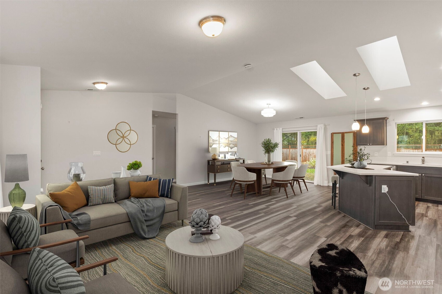 174 East Island View Avenue Port Townsend, WA 98368 - Photo 11 of 39 a living room with furniture kitchen view and a large window