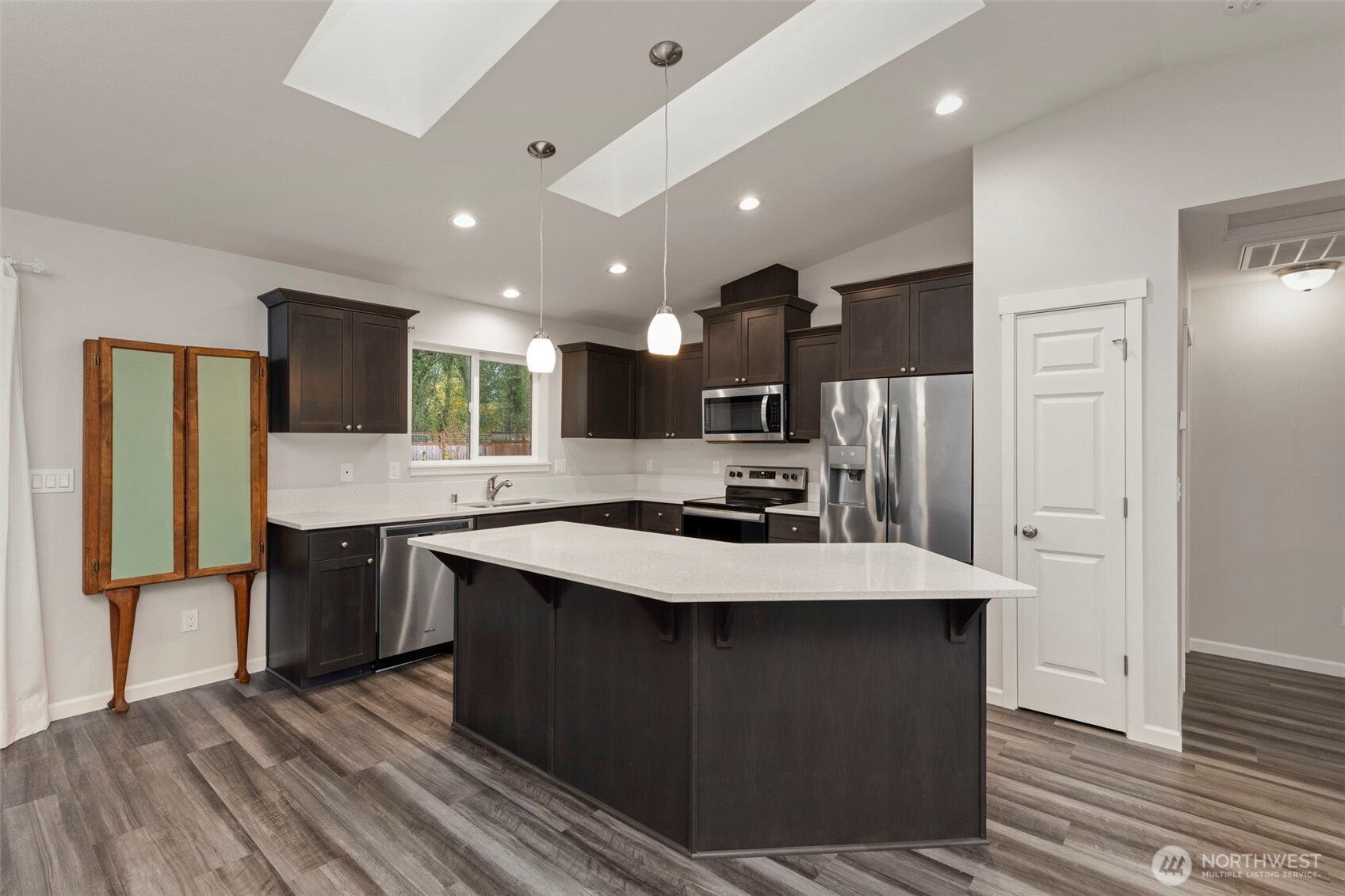 174 East Island View Avenue Port Townsend, WA 98368 - Photo 17 of 39 a large kitchen with kitchen island a sink stainless steel appliances and cabinets