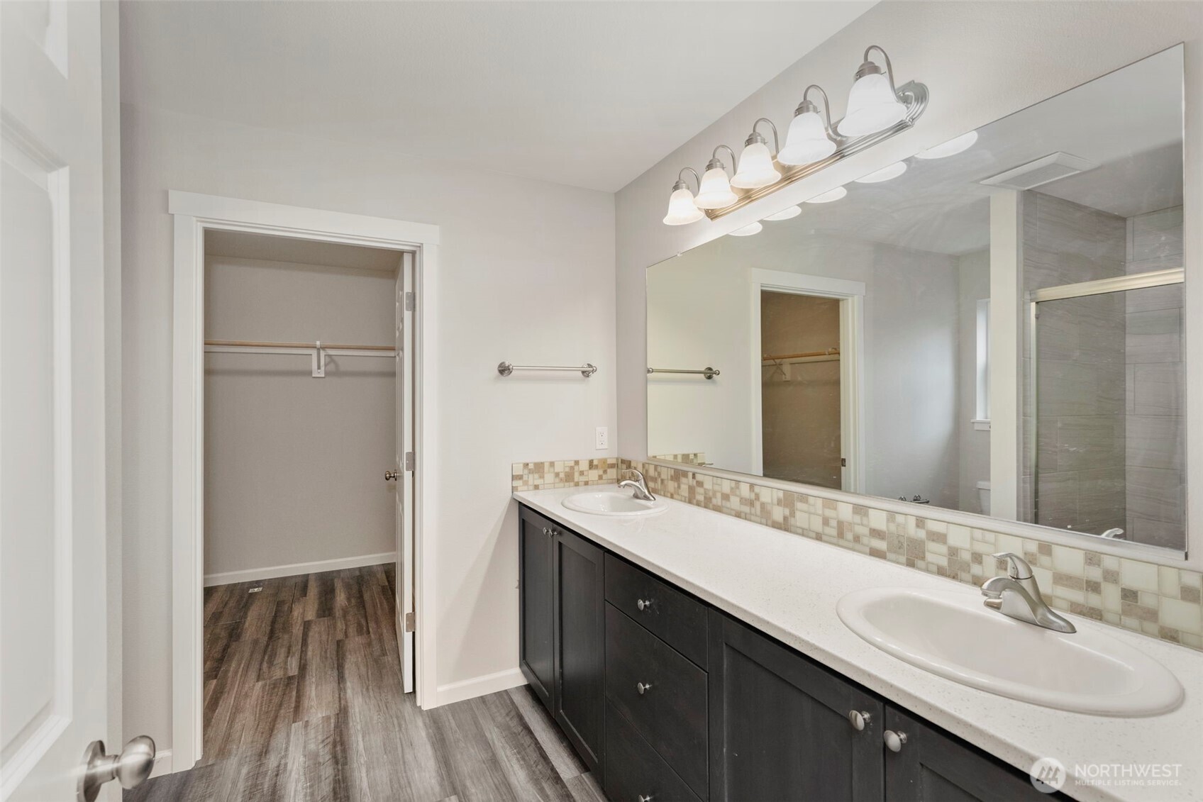 174 East Island View Avenue Port Townsend, WA 98368 - Photo 24 of 39 a spacious bathroom with a double vanity sink and a mirror
