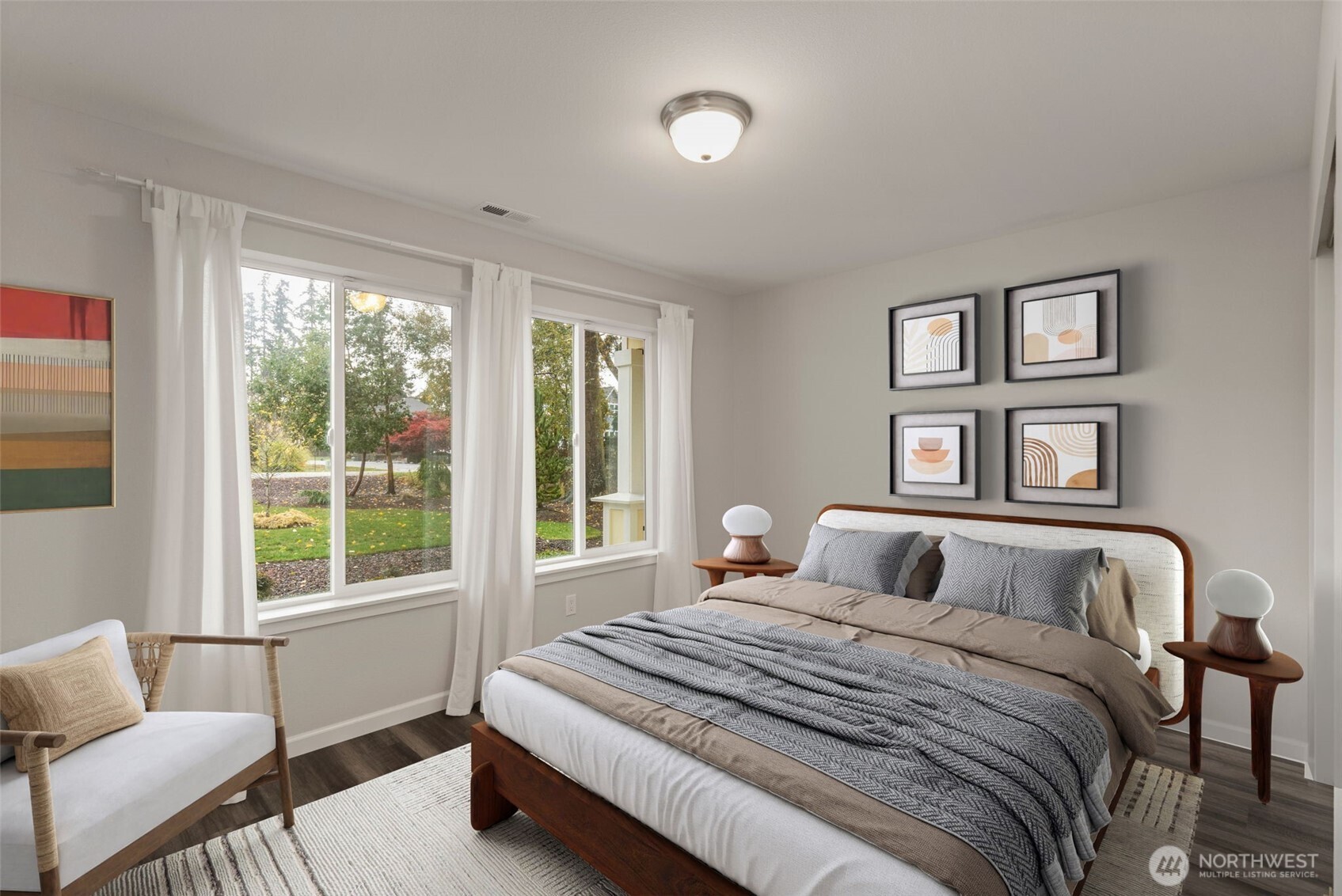 174 East Island View Avenue Port Townsend, WA 98368 - Photo 27 of 39 a bedroom with a large bed and a window with outer view