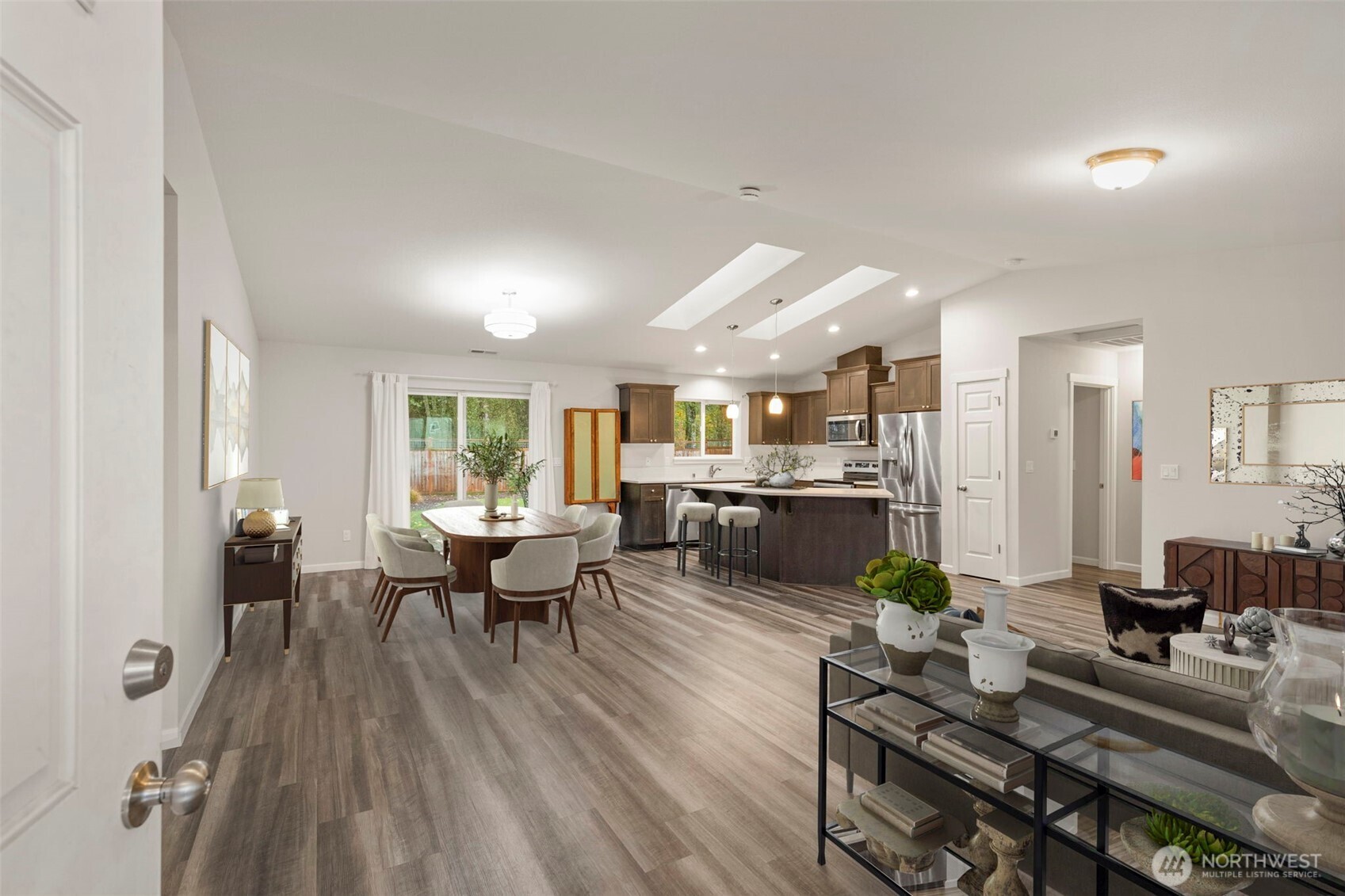 174 East Island View Avenue Port Townsend, WA 98368 - Photo 5 of 39 a living room with lots of furniture wooden floor and a large window