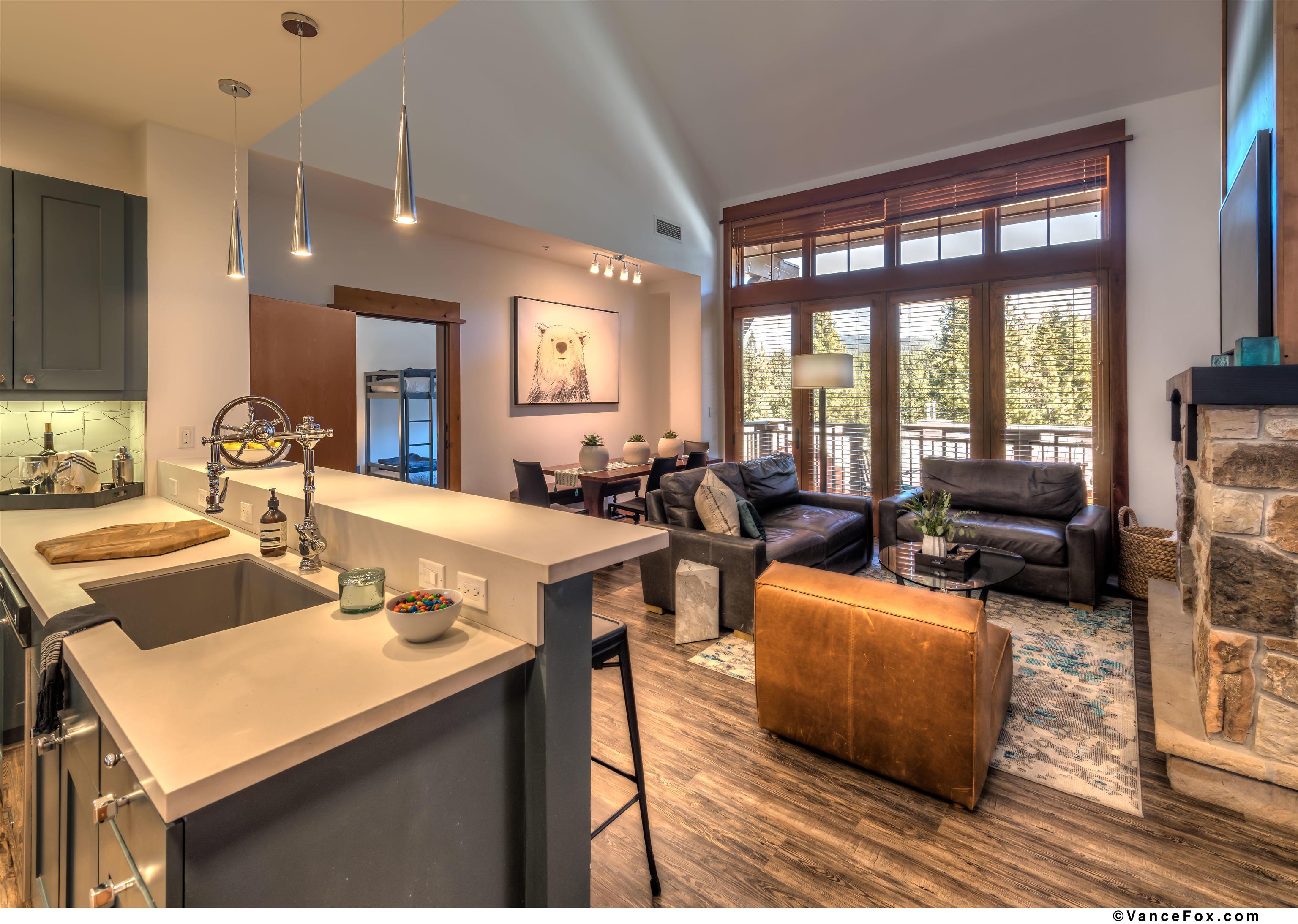 8001 Northstar Drive, Unit 403 Truckee, CA 96161 - Photo 1 of 10 a large living room with furniture and a large window