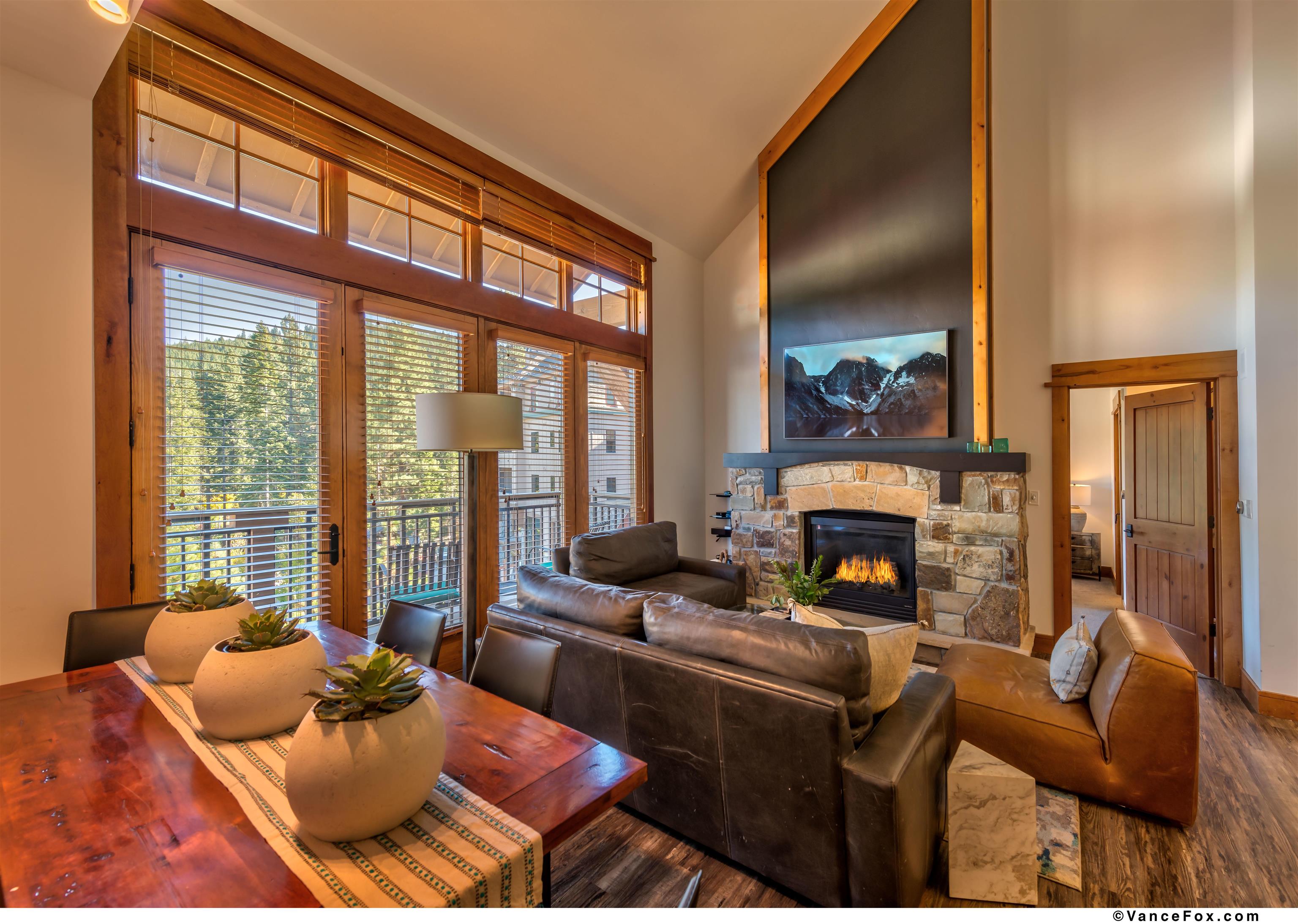 8001 Northstar Drive, Unit 403 Truckee, CA 96161 - Photo 2 of 10 a living room with furniture and a fireplace