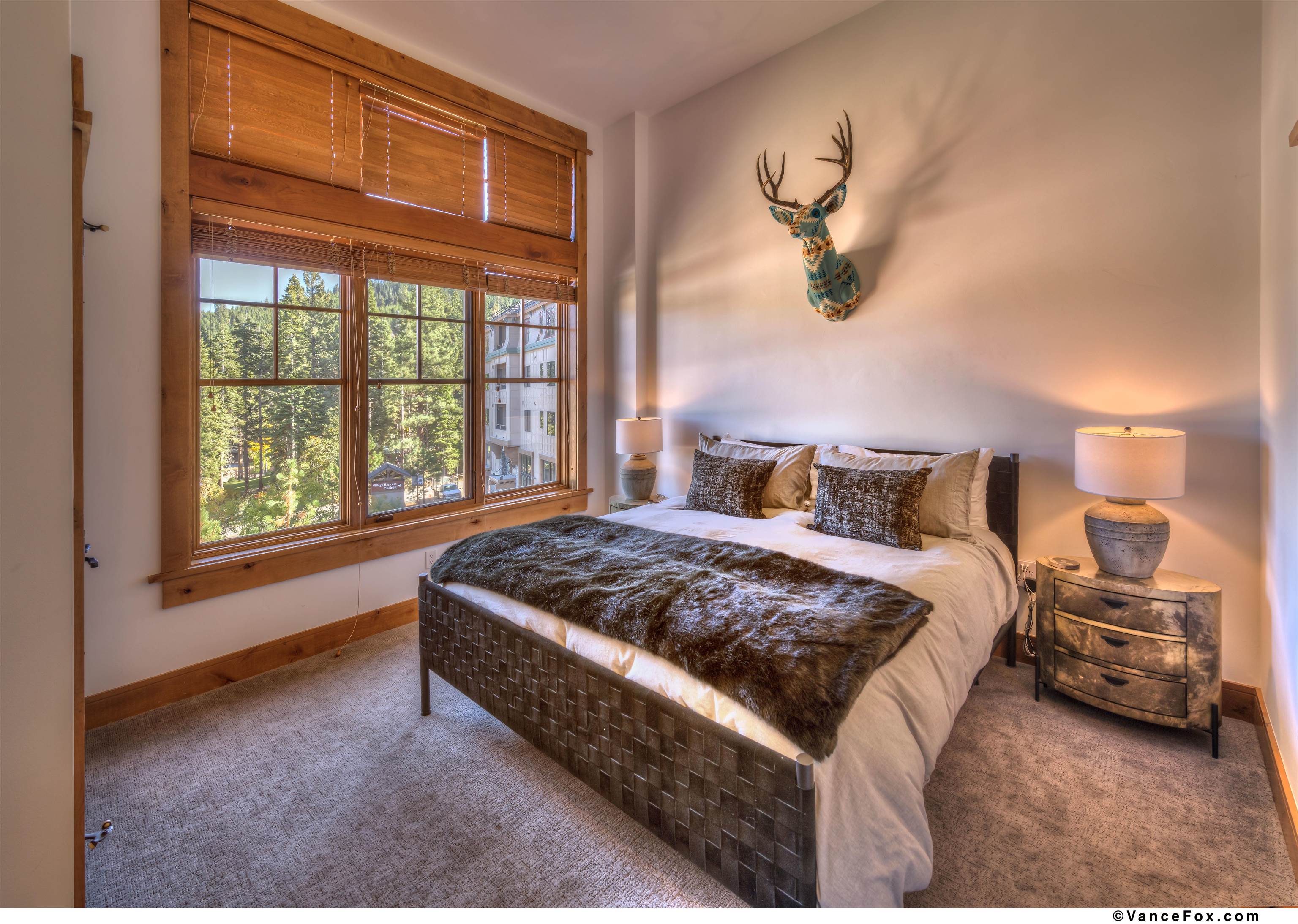 8001 Northstar Drive, Unit 403 Truckee, CA 96161 - Photo 5 of 10 a spacious bedroom with a bed and a large window