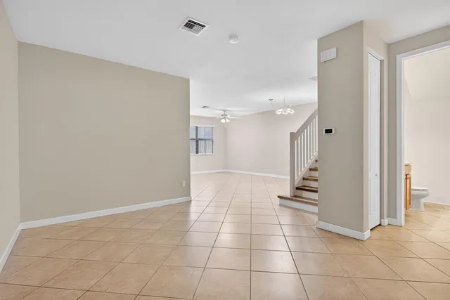 a view of storage and utility room with washer and dryer