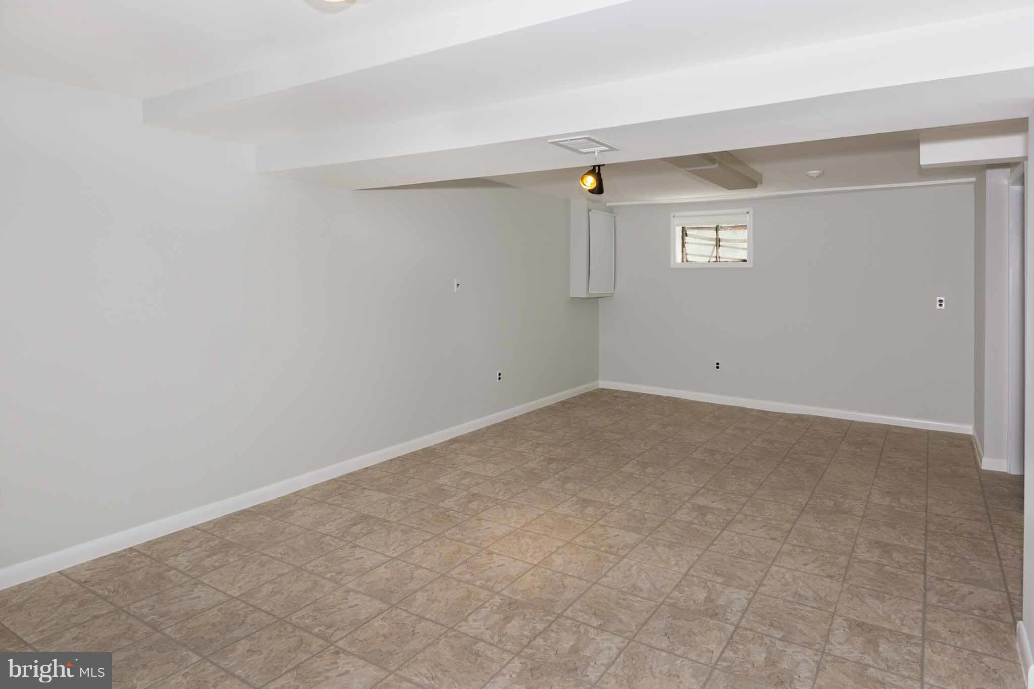 13405 Tamarack Road Silver Spring, MD 20904 - Photo 20 of 30 a view of an empty room with a window