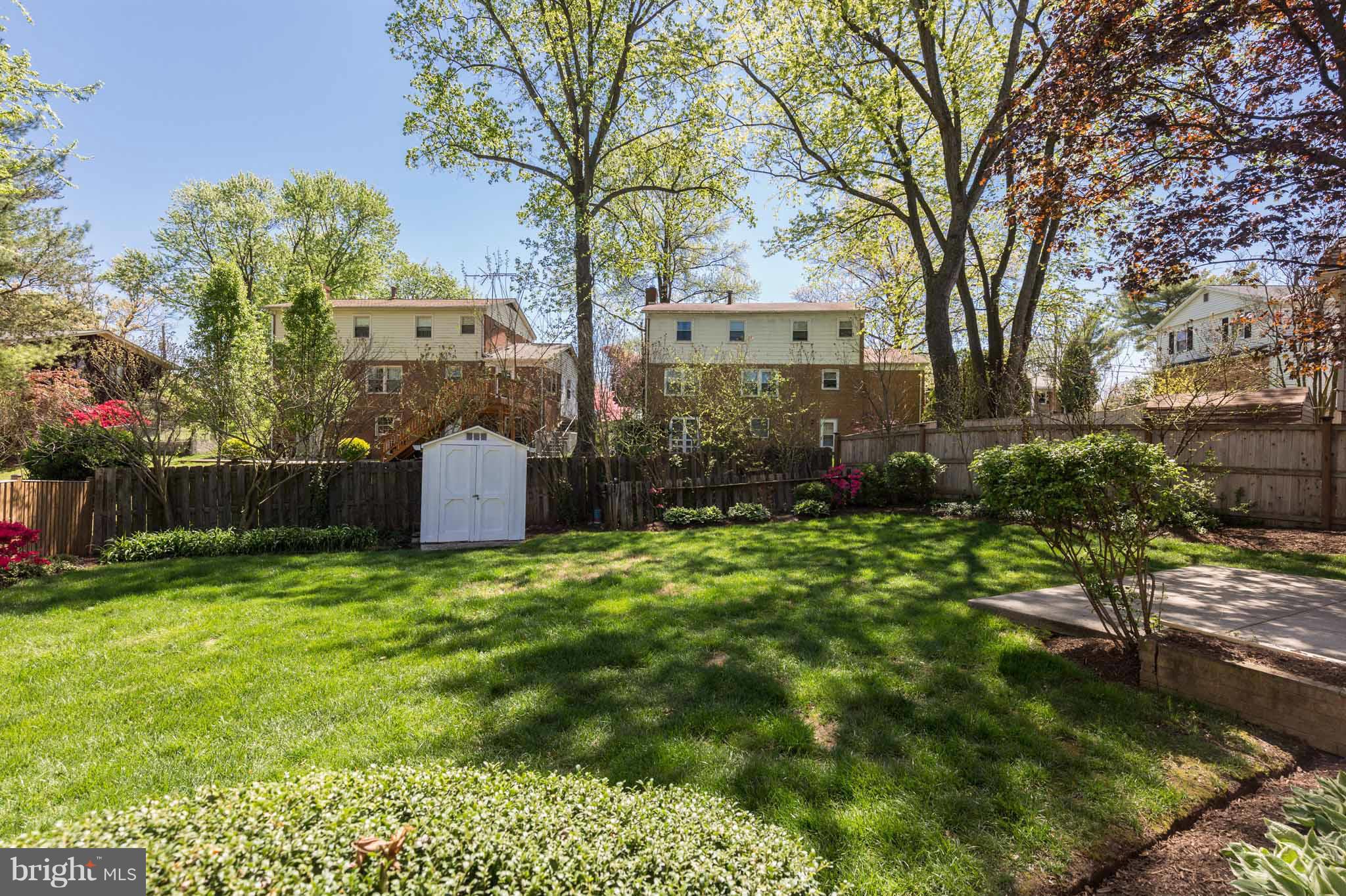13405 Tamarack Road Silver Spring, MD 20904 - Photo 26 of 30 a backyard of a house with lots of green space