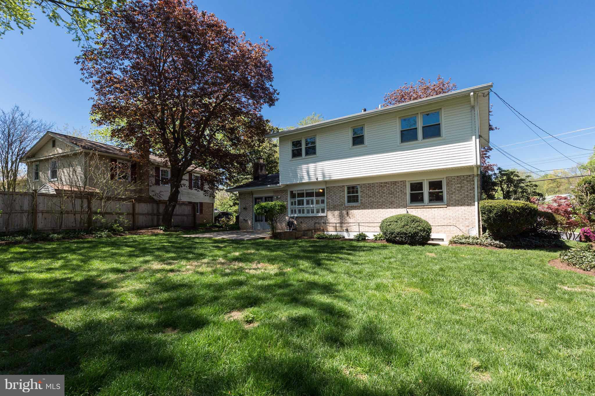 13405 Tamarack Road Silver Spring, MD 20904 - Photo 29 of 30 a front view of a house with a garden