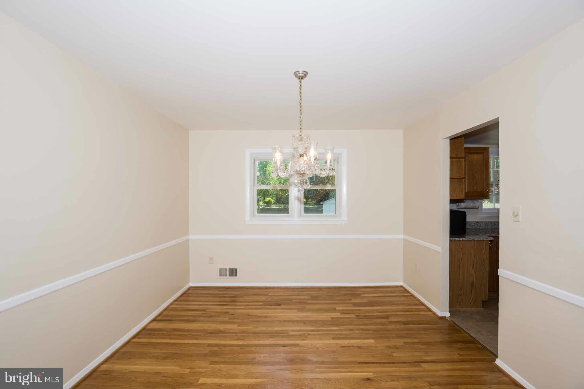 13405 Tamarack Road Silver Spring, MD 20904 - Photo 9 of 30 a view of an empty room with a window