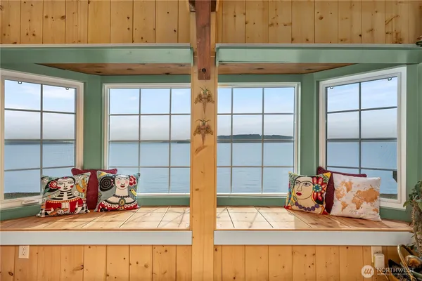 a bedroom with furniture and a bed