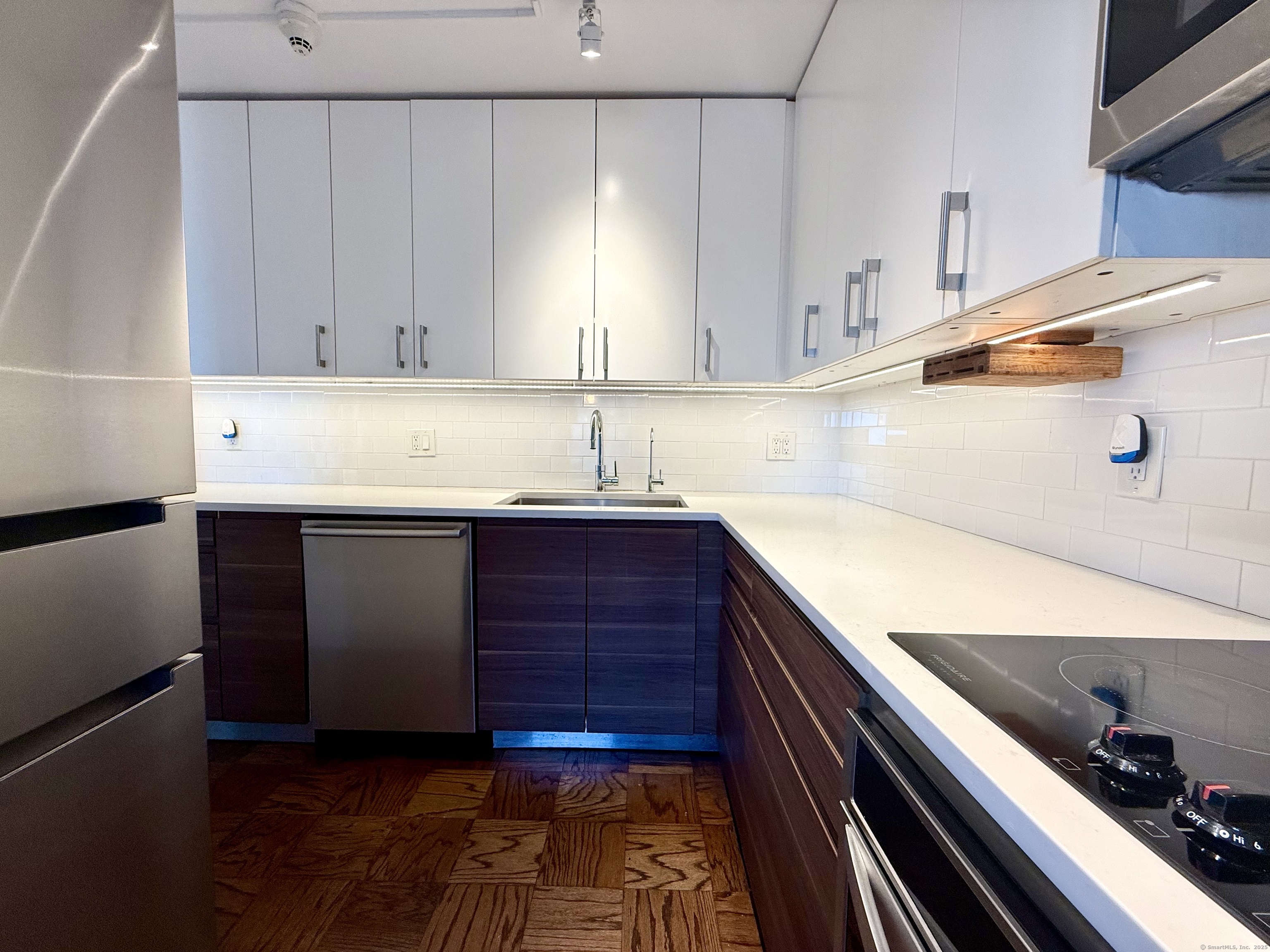 100 York Street, Unit 12S New Haven, CT 06511 - Photo 16 of 35 a kitchen with a sink and cabinets